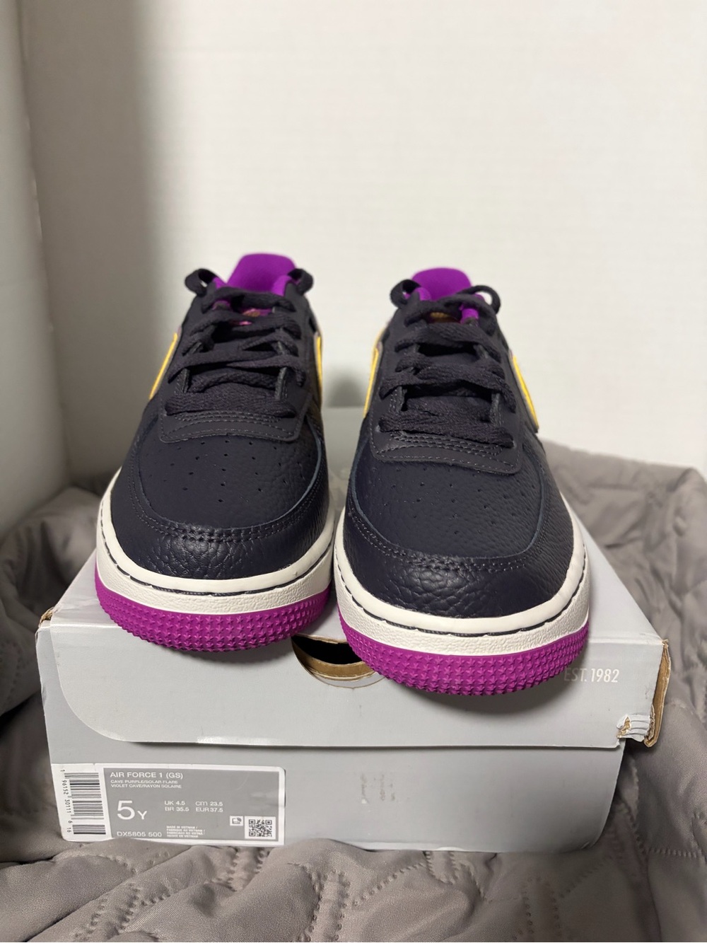 Nike Kids Black and Purple Sneakers with Yellow Swoosh